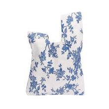 Load image into Gallery viewer, Knotted cotton lunch bag blue floral on white background

